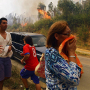 Ljudi reaguju na napredovanje šumskog požara u gradu Hualane, zajednici Koncepcion,